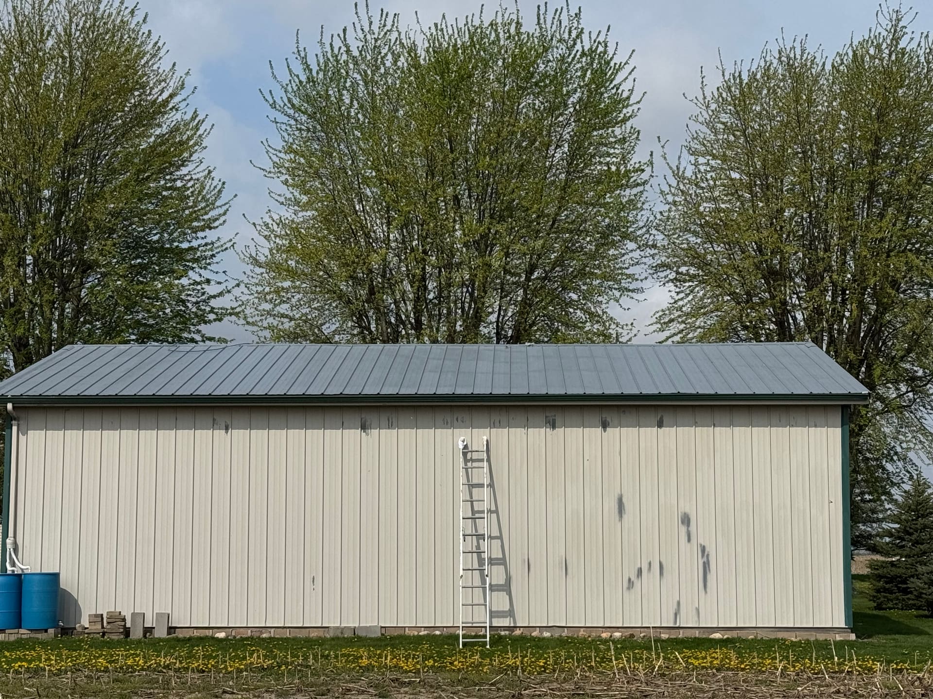 Pole barn on a rural property mid-repair